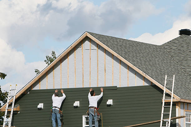 Professional Emergency Siding Repair technician working in Freeport, TX